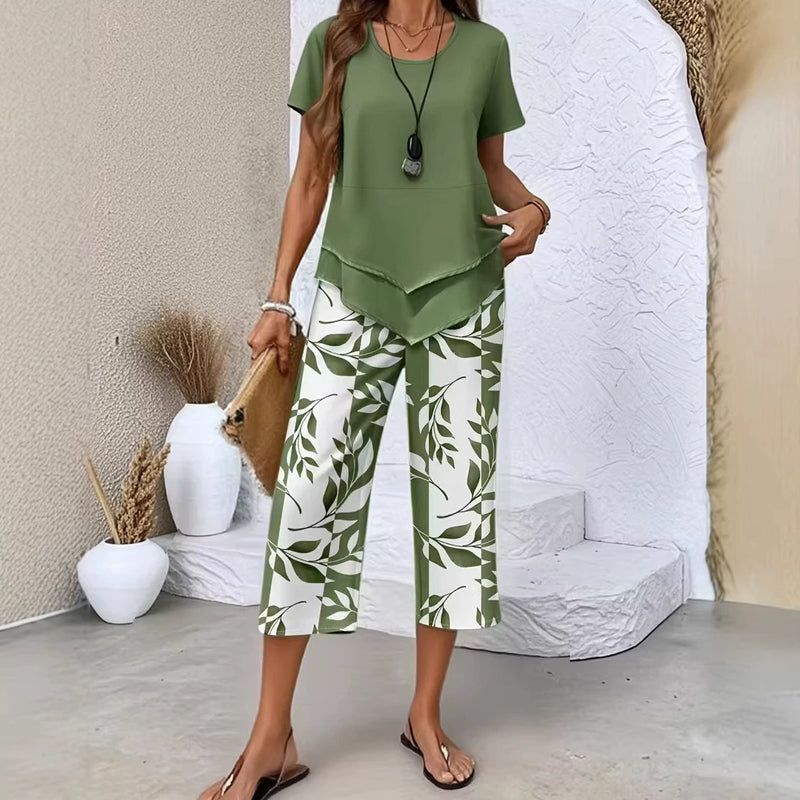 🎉53% Rabatt – Nur für kurze Zeit!✨ Modisches 2-in-1-Set | Oberteil mit asymmetrischem Saum + bedruckte Hose | S–5XL 👗