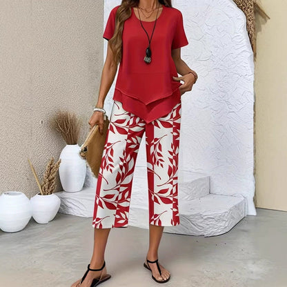 🎉53% Rabatt – Nur für kurze Zeit!✨ Modisches 2-in-1-Set | Oberteil mit asymmetrischem Saum + bedruckte Hose | S–5XL 👗